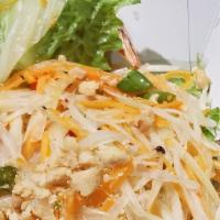 Papaya Salad · Traditional salad with green julienne papaya, peanut, grilled shrimp, green bean, carrot, an...