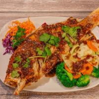 Whole Fish · Deep fried whole Red Snapper serves with your choice of sauce spicy basil, sweet sour pineap...