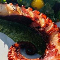 Polpo Alla Griglia Con Insalata · Grilled octopus, spring mix, and pesto.