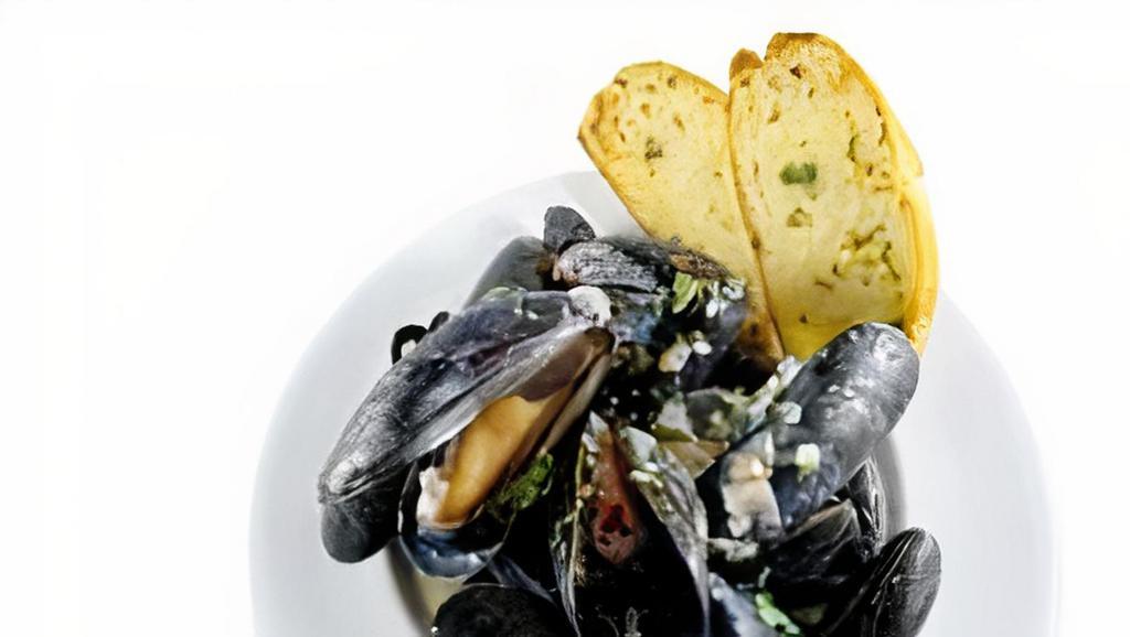Native Steamed Mussels · Succulent mussels steamed in white wine and our lemon tomato butter.