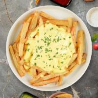 American Cheese Overload Fries · Idaho potato fries cooked until golden brown garnished with salt and american cheese.