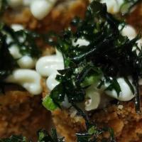Hot Roll Crispy (8 Piece) · Breaded Rice, salmon, nori seaweed with cream cheese, unagi sauce, and crispy cabbage.