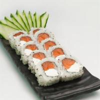 Uramaki Filadelfia (8 Pieces) · Rice, salmon and cream cheese, nori seaweed and sesame.