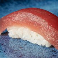 Nigiri Tuna (1 Piece) · Rice and tuna.