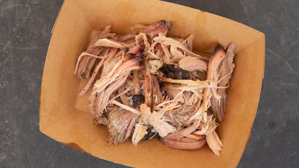Pulled Pork (1/2 Lb) · 1/2 lb pulled pork shoulder, slow smoked 12-15 hours over a mesquite and oak fire