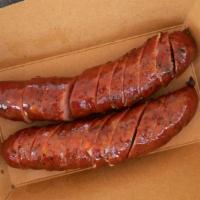 Classic Hot Link (1/2 Lb) · 1/2 lb classic sausage (salt, pepper, and garlic) slow smoked over a mesquite and oak fire