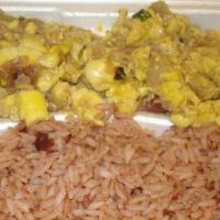 Ackee & Saltfish · made with salted fish and the national fruit ackee. Served with yam, banana, dumpling.