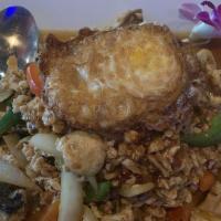 Pad Krapow (Mild Heat) · Ground chicken, beef, or pork stir-fried with fresh chilies and basil leaves in special mild...