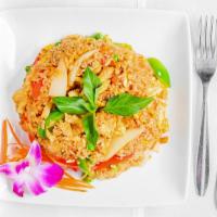 Basil Fried Rice (Dinner) · Jasmine rice stir-fried with mild chili paste, green and red peppers, green peas, carrots, o...