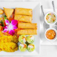 Bangkok Sampler · Vegetarian option is available. Platter of crispy, veggie and soft spring rolls, satay, gold...