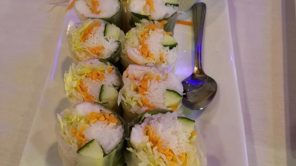 Soft Spring Rolls · Vegetarian option is available. Chicken, rice noodles, lettuce, carrots, cucumber, basil leaves and cilantro wrapped in rice paper served with our house peanut sauce.