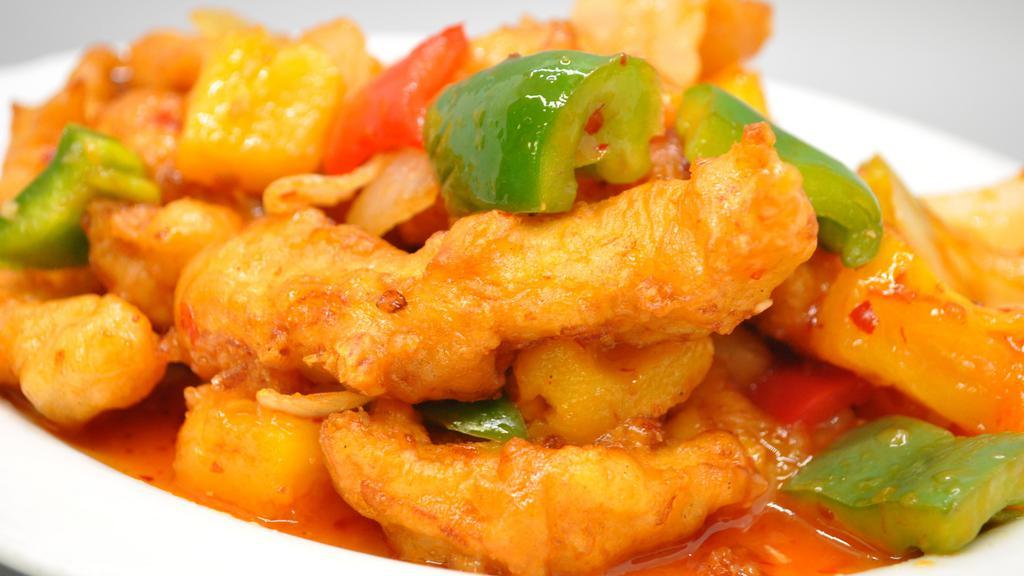 Spicysweetchicken · Hot and Spicy. Crispy chicken stir fried with green bell pepper, red bell pepper, yellow onion and pineapple in garlicky sweet and spicy sauce.