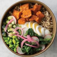Sweet Potato Goddess Bowl · A bed of brown rice and quinoa topped with sautéed organic baby kale, sliced hardboiled egg,...
