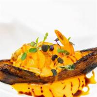 Yola · A whole fried sweet plantain with Ninja’s shrimp inside.
