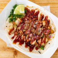 Chicken · Grilled chopped chicken breast, served on a flour tortilla with cilantro, onions, homemade g...
