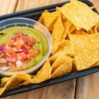 Guacamole · 8 oz of fresh avocados with cilantro, onions, tomatoes, sea salt and lime juice, served with...