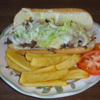 Steak & Cheese With French Fries · Made with beef, green peppers, onions, provolone cheese, lettuce, and tomatoes on sub roll. ...