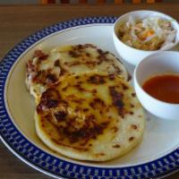2 Cheese Pupusas · Corn tortillas stuffed with cheese.  Served with marinated cabbage.