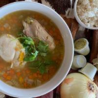Chicken Soup With Vegetables · Succulent chicken Soup cooked with vegetables and served with white rice.