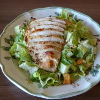 Caesar Salad · Grilled Chicken, Romaine lettuce, Parmesan cheese. Seasoned croutons and dressing.