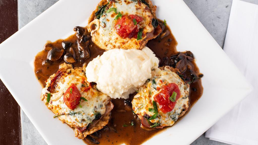 Veal Ava · Layered with prosciutto, mozzarella cheese, tomato, mushroom, served over sauteed spinach in a sherry wine sauce.