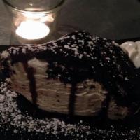 Oreo Ice Cream Pie · Chocolate Cookie Crust with Vanilla Ice Cream Topped with Chunks of Oreos and Chocolate Fudge