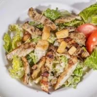 Grilled Chicken Caesar Salad · Your choice of chicken or beef, romaine lettuce croutons, parmesan cheese and Caesar dressing.