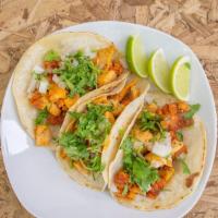 Mix Tacos · 3 soft tacos (Chicken, Chorizo, & Steak) served with corn tortilla, onion, cilantro, lemon, ...