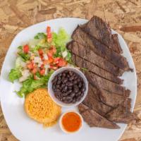 Carne Asada Steak Plate · Steak served with rice, pico de gallo, black beans, two corn tortillas and hot sauce on the ...