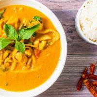 Red Curry · Thai spicy red curry, coconut milk, chickpea, green pea, red & green bell peppers, basil, an...