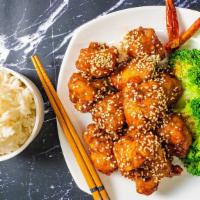 Sesame Chicken · Deep-fried chicken meat in sweet & tangy garlic ginger soy sauce with a sprinkle of roasted ...