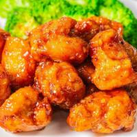 Orange Chicken · Deep-fried chicken meat in orange flavor sweet and slightly spicy garlic ginger soy sauce. S...
