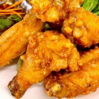 Chicken Wings · Chicken drumsticks and wings dipped in marinated battered deep fried to perfection. Served w...