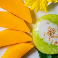 Sweet Sticky Rice With Mango · Sticky rice cooked in sweet coconut milk. Served with fresh mango.