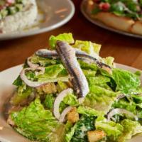 Romaine Salad · Romaine Lettuce, Spanish White Anchovies, Parmesan Cheese, Red Onion, Garlicky Croutons, Lem...