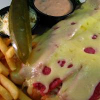 Reuben · Our open faced version of the deli classic includes a mound of grilled corned beef, swiss ch...
