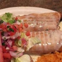 Fajita Chimichangas · Two flour tortillas, fried or soft, grilled chicken or steak, onions, peppers, tomatoes, top...
