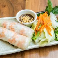Goi Cuon (2) - Summer Roll · Steamed shrimp, lettuce, and vermicelli noodles in rice paper, served with peanut sauce.