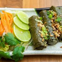 Bo La Nho (3) · Grilled beef wrapped in grape leaves.
Marinated ground beef, wrapped in grape leaves, then g...