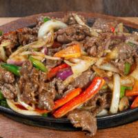 Sizzling Beef · Spicy. Marinated beef stir fried w. chef's sha-cha sauce.