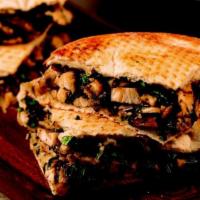 Chicken Portabella Sandwich · Flamed-grilled chicken sautéed with fresh spinach, Portabella mushrooms, Sicilian extra-virg...