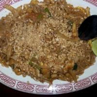 Pad Thai · Thai rice noodles with eggs, roasted peanuts, scallions, dried bean curd, fresh bean sprouts...