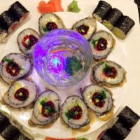 Sushi Platter · Seven pieces of assorted nigiri sushi and tuna or California roll.