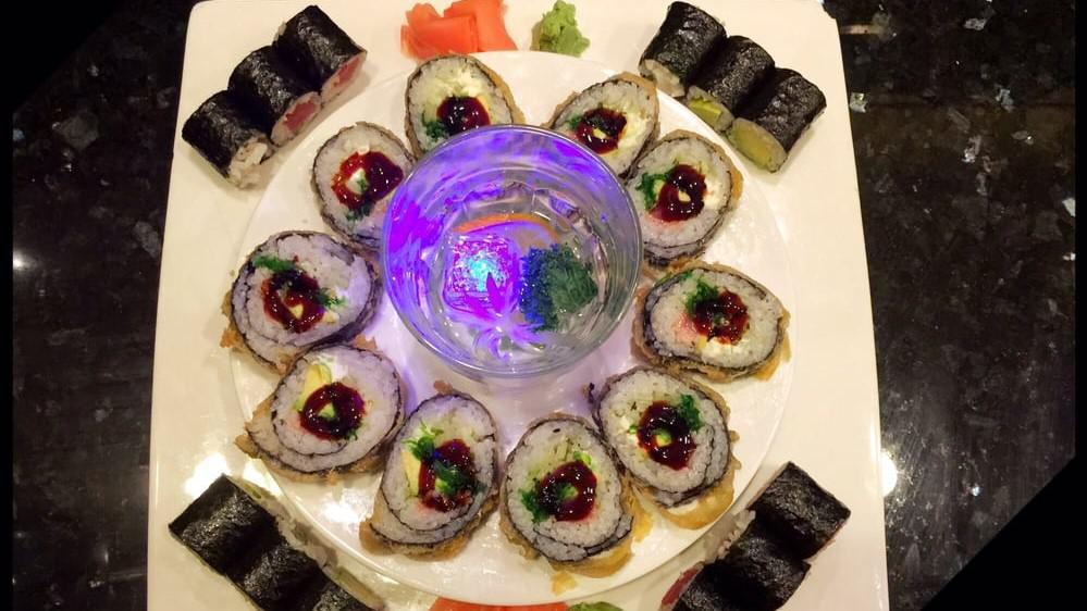 Sushi Platter · Seven pieces of assorted nigiri sushi and tuna or California roll.