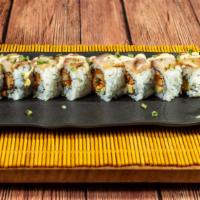 Rising Sun Roll · Rice cracker battered scallop with tomago inside topped with seared marinated yellow tail, F...