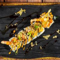 Black Pearl · Mango, kaiware, salmon, jalapeno, and fried crab sticks, topped with black tobiko, yuzu sauc...