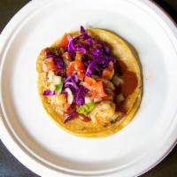 Shrimp Taco · Sauteed shrimp in garlic-cilantro butter, served on a soft corn tortilla with jack cheese, c...