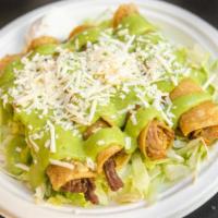 Chicken Taquitos (4) · Corn tortillas filled with chicken, rolled, then deep fried until crisp. Served with lettuce...