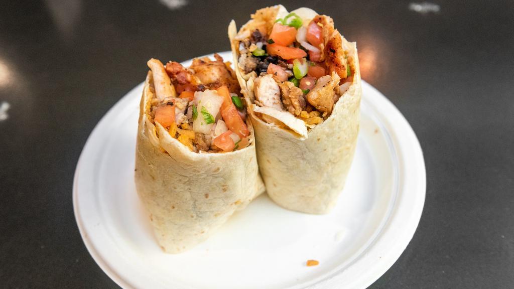 Grilled Chicken Burrito · Grilled chicken, rice, beans, jack cheese, pico de gallo salsa and our salsa fiesta all rolled into a soft, warm flour tortilla.