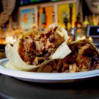 Pork Burrito · Rolled in a large flour tortilla, with roasted pork, rice, refried pinto beans or vegetarian...